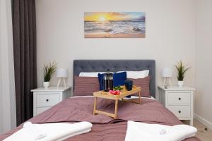 Posteľ alebo postele v izbe v ubytovaní Klifowa Premium Resort with SPA, Fitness & Kids Club by Noclegi Renters