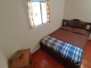Postel nebo postele na pokoji v ubytování Nuestro Bosque I