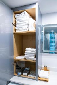 a towel rack with towels in a bathroom at Luxury Accommodations Brickell in Miami
