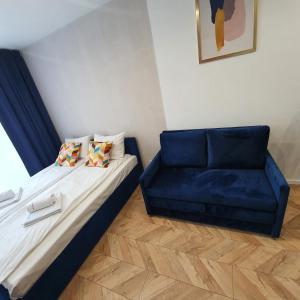 Łóżko lub łóżka w pokoju w obiekcie Ice Apartments