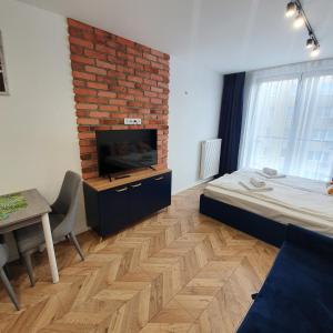 Łóżko lub łóżka w pokoju w obiekcie Ice Apartments