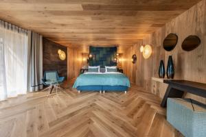 Ένα ή περισσότερα κρεβάτια σε δωμάτιο στο Hotel Fanes