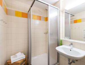 Ein Badezimmer in der Unterkunft JUFA Hotel im Weitental - Bruck an der Mur