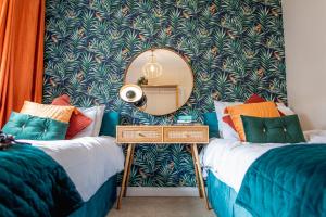 Katil atau katil-katil dalam bilik di Kelswick Lodge