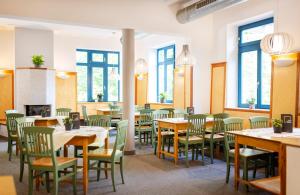 Reštaurácia alebo iné gastronomické zariadenie v ubytovaní JUFA Hotel Bruck an der Mur - im Weitental