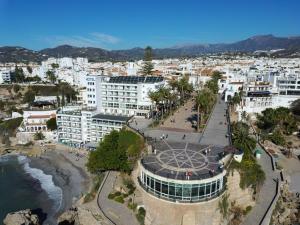 an aerial view of a city with buildings at Hotel Balcón de Europa in Nerja