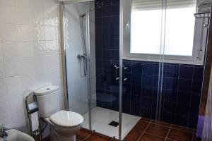 Un baño de Suites Trastámara