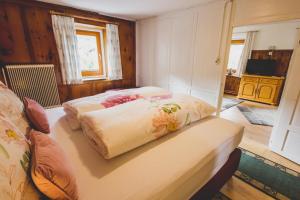 Postel nebo postele na pokoji v ubytování Haus Kathrein