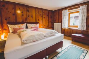 Postel nebo postele na pokoji v ubytování Haus Kathrein