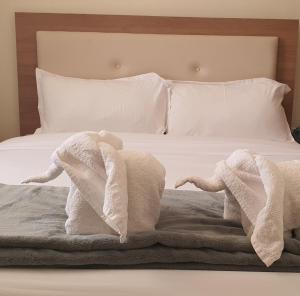 Walabi Mara Hotel客房内的一张或多张床位