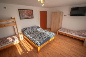 Postel nebo postele na pokoji v ubytování Wesołówka - dom do wynajęcia