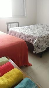 Postel nebo postele na pokoji v ubytování APT em Santos perto de tudo SHOPPING E PRAIA