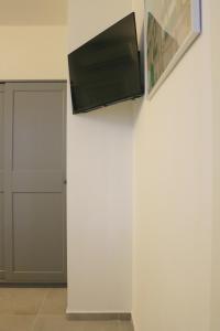 Televízia a/alebo spoločenská miestnosť v ubytovaní Central Station Milano Room - 2