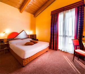 Letto o letti in una camera di La Villa - Sure Hotel Collection by Best Western