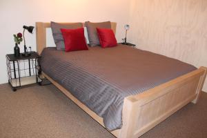 מיטה או מיטות בחדר ב-Halte Liempde Logies