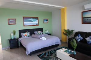 Postel nebo postele na pokoji v ubytování Grace Wave Resort