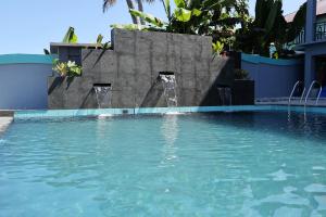 Bazén v ubytování Grace Wave Resort nebo v jeho okolí