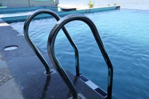 Bazén v ubytování Grace Wave Resort nebo v jeho okolí