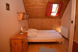 Voodi või voodid majutusasutuse Schmidt nyaraló Fonyód toas +15 fotot
