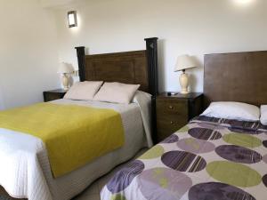 Ένα ή περισσότερα κρεβάτια σε δωμάτιο στο Figaro Hotel Samana