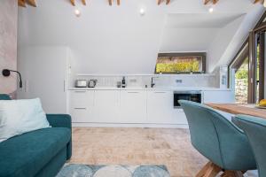 A kitchen or kitchenette at Gejzír Vendégház