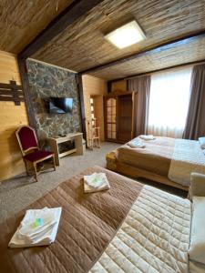 Postel nebo postele na pokoji v ubytování Guest house Shulc