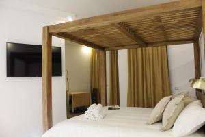Postel nebo postele na pokoji v ubytování Domino Hotel