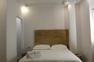 Postel nebo postele na pokoji v ubytování Domino Hotel