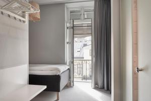 Postel nebo postele na pokoji v ubytování Moment Hotels + 37 fotografií