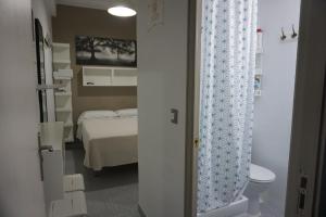 Koupelna v ubytování Pensión Casa Blanca + 37 fotografií
