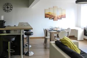a living room with a couch and a table at Miracle Morning in La Grande Motte