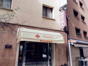 a hotel sign on the side of a building at HOTEL FESTA BRAVA in Andorra la Vella