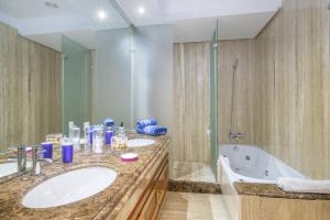 A bathroom at High standard beach front apartment