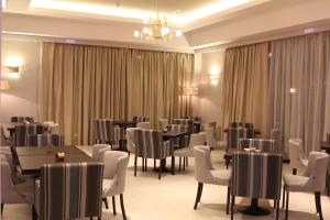 Posezení v ubytování Achilles Hotel