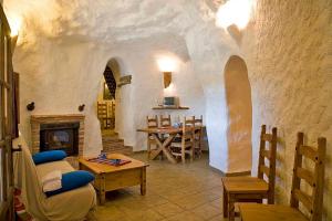 Un restaurante o sitio para comer en Cuevas La Atalaya