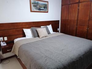 Voodi või voodid majutusasutuse La Aurora Hotel Like Home toas