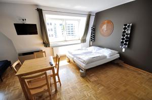 Ένα ή περισσότερα κρεβάτια σε δωμάτιο στο Five Elements Hostel and Capsules Frankfurt