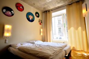 Ένα ή περισσότερα κρεβάτια σε δωμάτιο στο Five Elements Hostel and Capsules Frankfurt