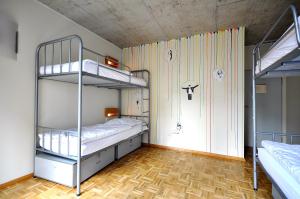 Ένα ή περισσότερα κρεβάτια σε δωμάτιο στο Five Elements Hostel and Capsules Frankfurt