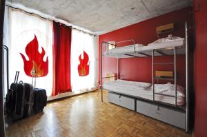 Ένα ή περισσότερα κρεβάτια σε δωμάτιο στο Five Elements Hostel and Capsules Frankfurt