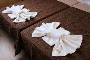 A bed or beds in a room at Hotel Terra