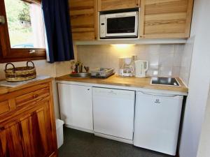 A cozinha ou cozinha compacta de Appartement Chamrousse, 2 pièces, 5 personnes - FR-1-340-41