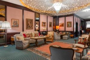 Posezení v ubytování Tante ALMA's Mannheimer Hotel
