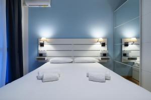Voodi või voodid majutusasutuse PrimoPiano - Via Pavia toas