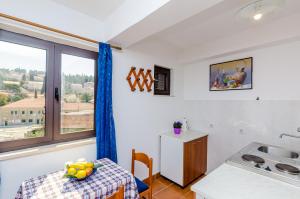 Ein Bett oder Betten in einem Zimmer der Unterkunft Apartments & Rooms Mihajica