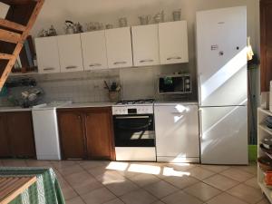 Η κουζίνα ή μικρή κουζίνα στο Maison de charme Corse sauvage
