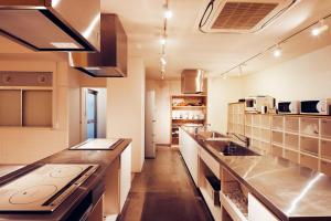 A kitchen or kitchenette at HOTEL GRAPHY NEZU - Vacation STAY 82132