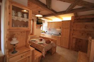 Kuchyň nebo kuchyňský kout v ubytování Chalet Pian