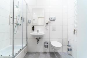 Koupelna v ubytování Upper Room Hotel Kurfürstendamm + 37 fotografií