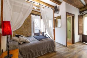 Postel nebo postele na pokoji v ubytování La Pata de Oca Hostal Rural y Albergue